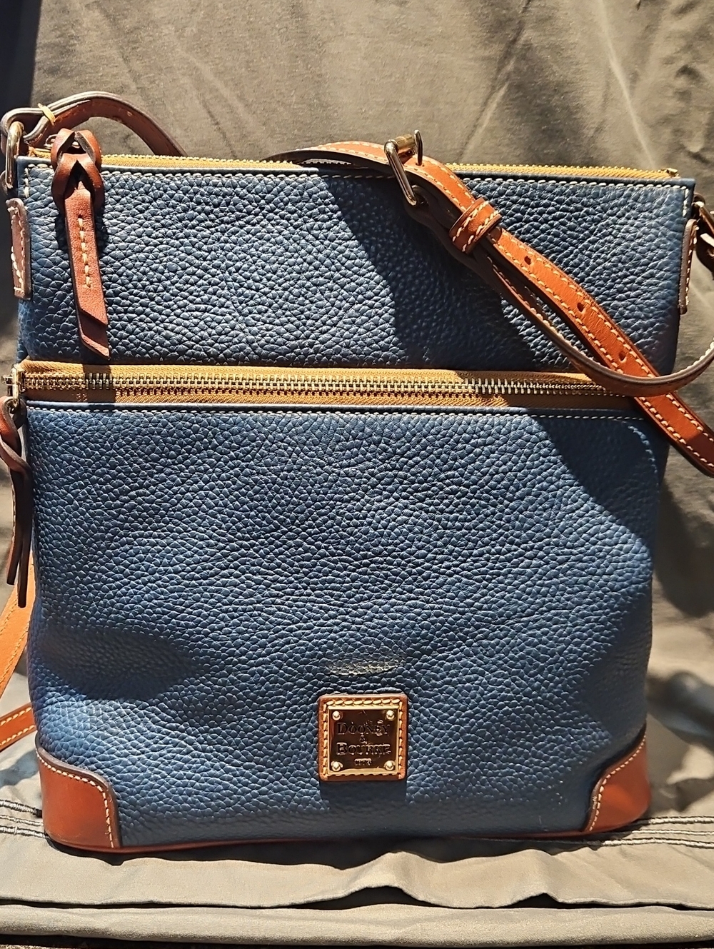 Dooney & Bourke Blue Pebble Leather Crossbody Bag with Brown Trim